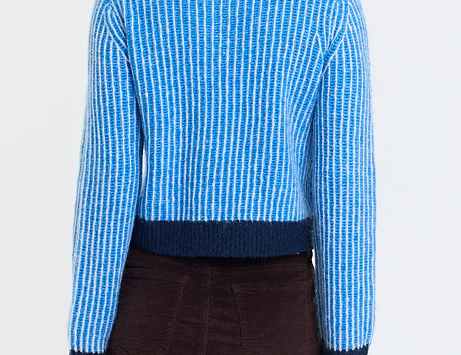 Back view of a blue ribbed striped cardigan with a navy ribbed hem and cuffs