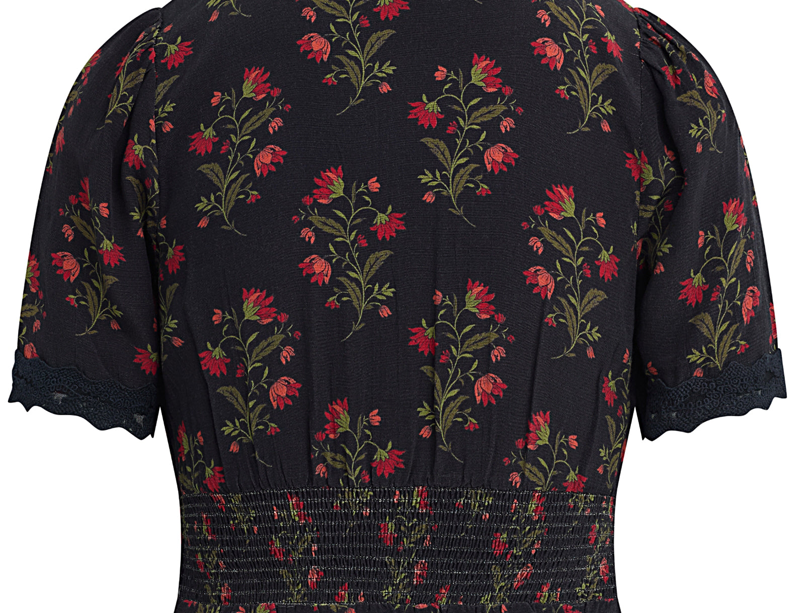 The back view of a short-sleeve blouse featuring a dark navy blue base with a red and green floral pattern, a smocked waist, and ruffled lace trim at the sleeves and hem.
