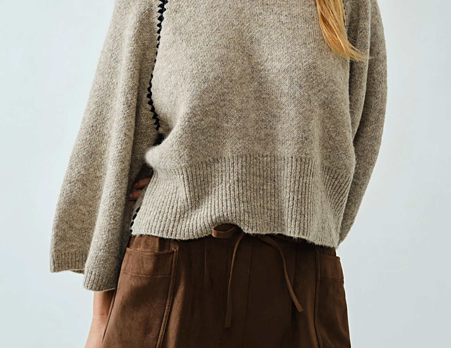 Oatmeal cropped raglan sweater with contrast stitching, front view